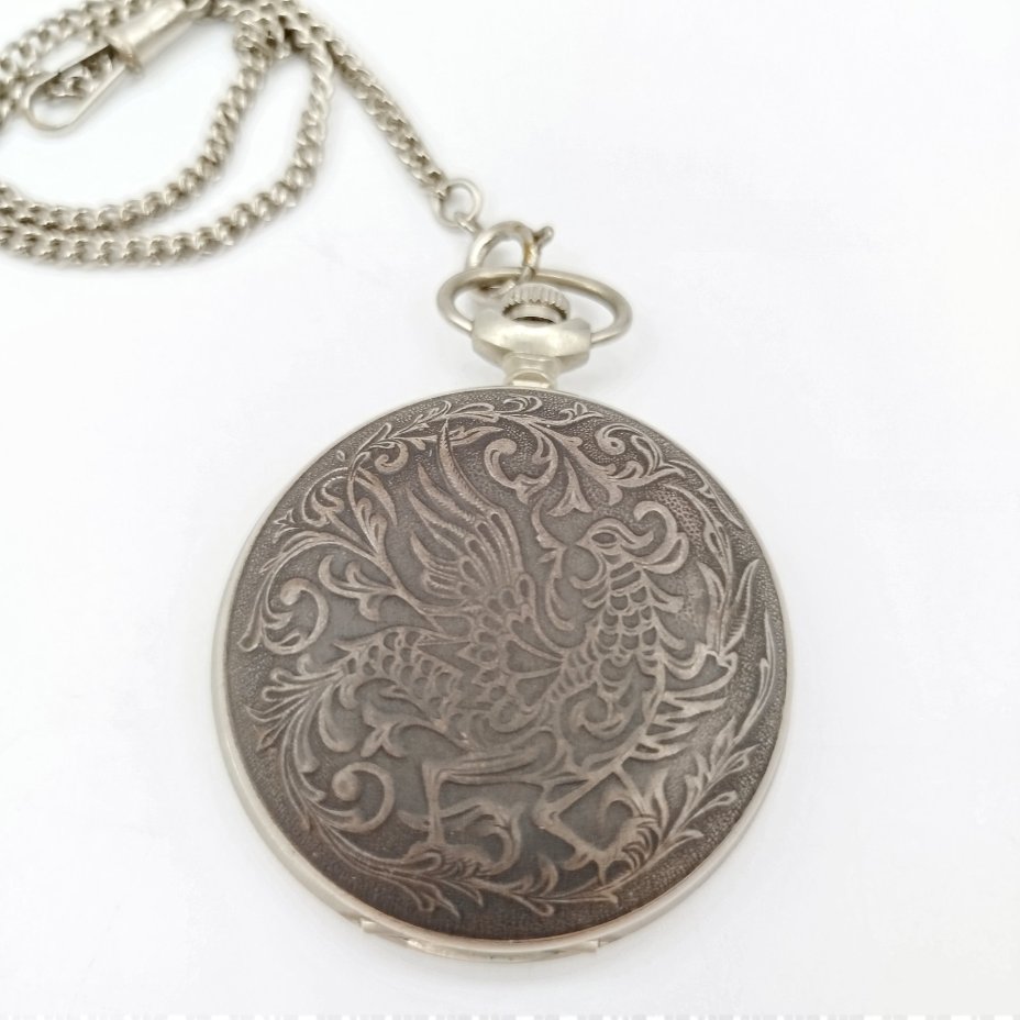 Часы карманные "Жар-птица", металл, бумага, печать, Челябинский часовой завод «Молния», СССР, 1980-1990 гг.