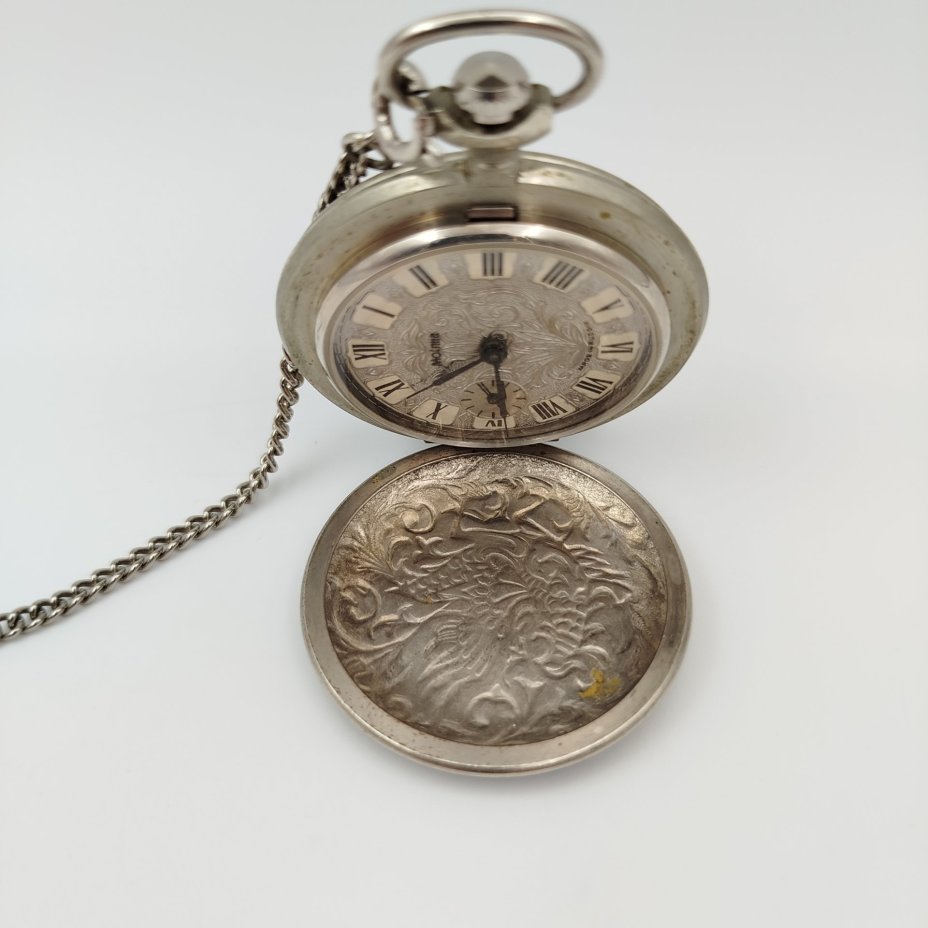 Часы карманные "Жар-птица", металл, бумага, печать, Челябинский часовой завод «Молния», СССР, 1980-1990 гг.