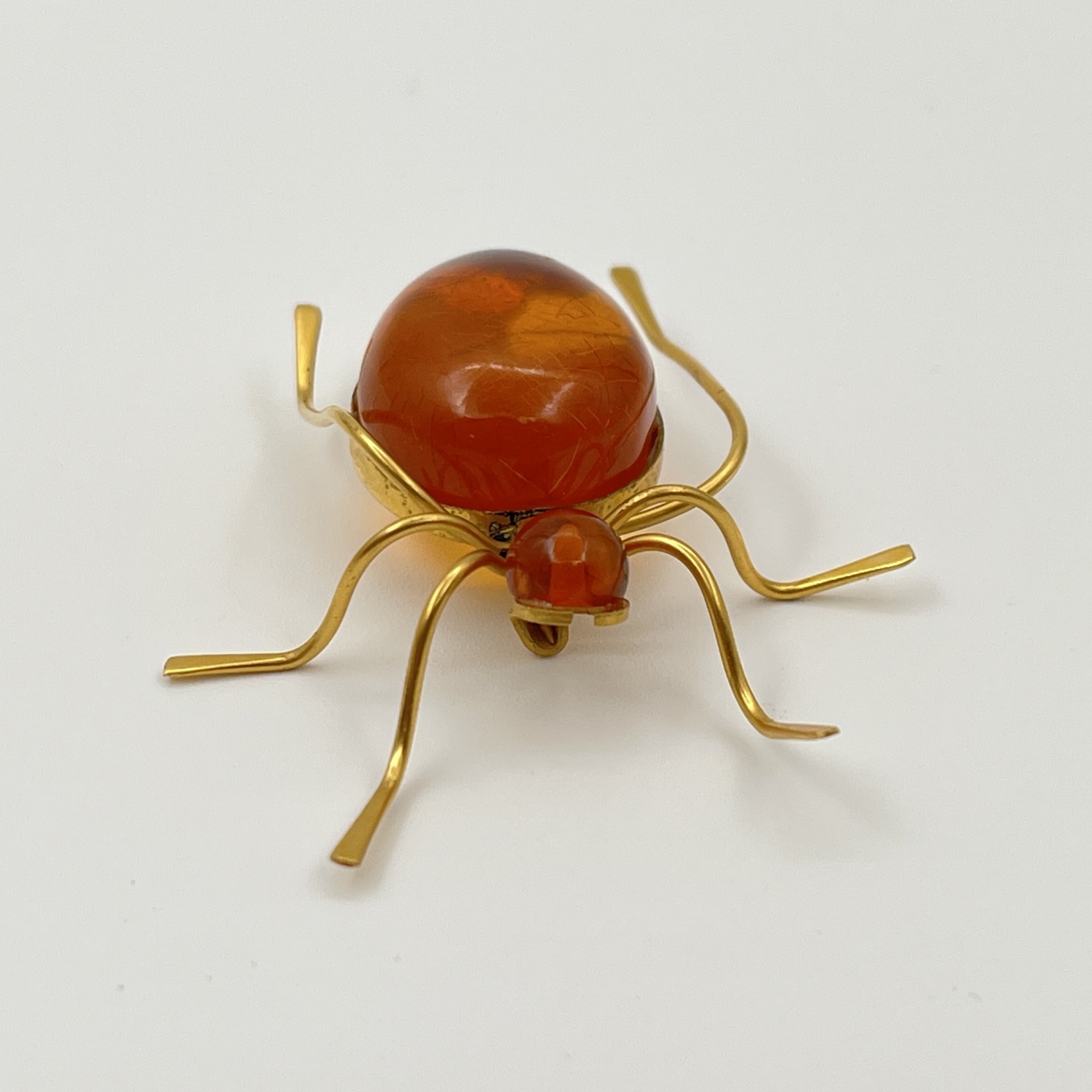 Брошь винтажная "Паук", янтарь, латунь, золочение, Калининградский янтарный комбинат, СССР, 1987-1992 гг.