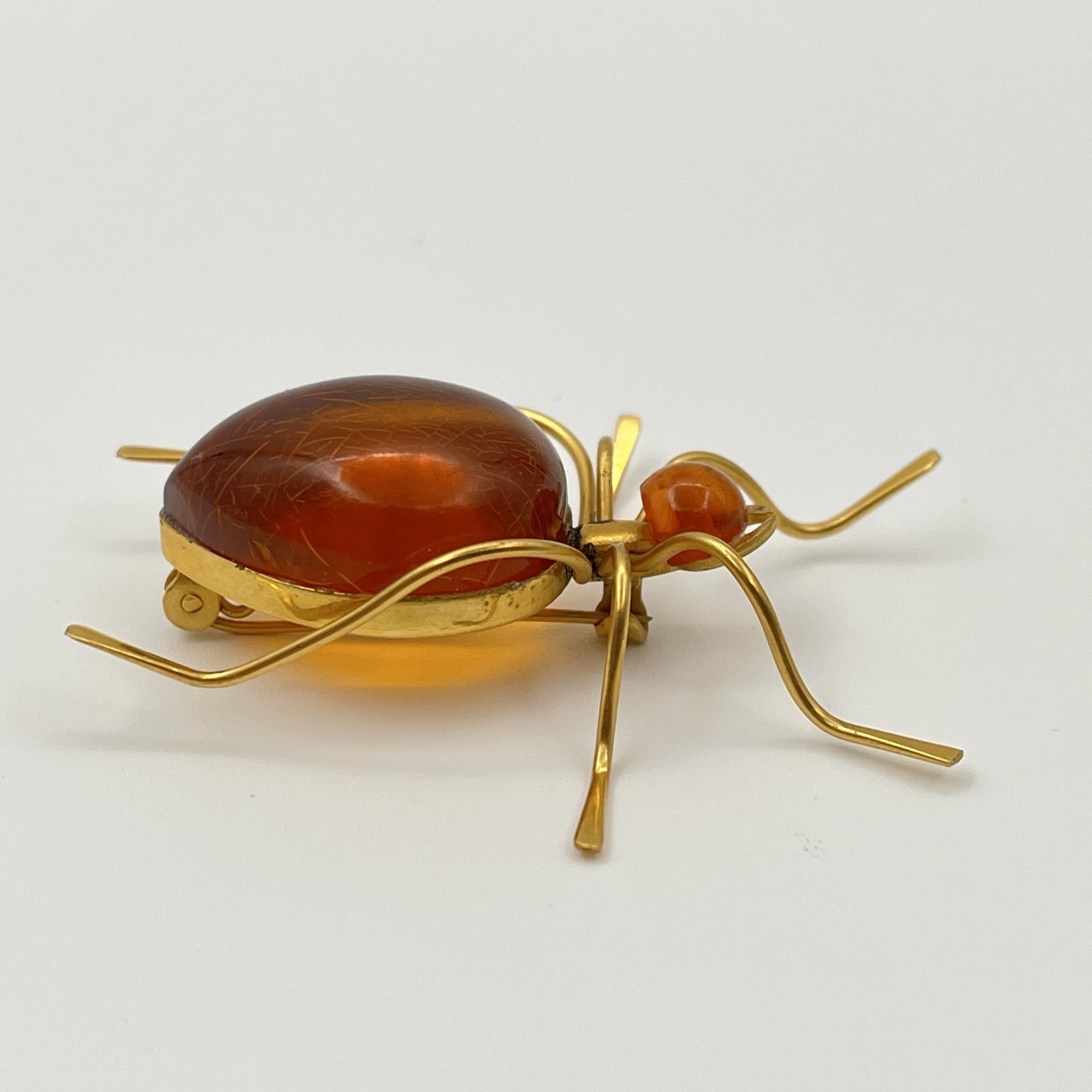 Брошь винтажная "Паук", янтарь, латунь, золочение, Калининградский янтарный комбинат, СССР, 1987-1992 гг.
