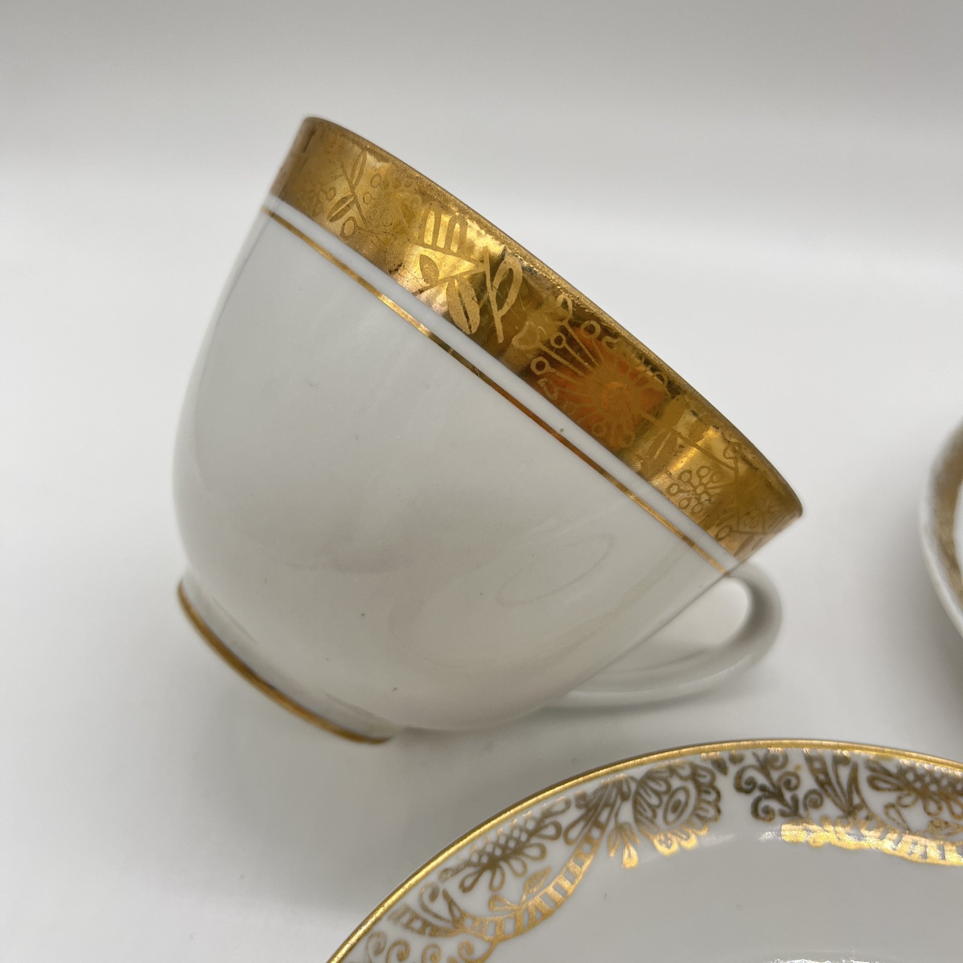 Чайное трио с декором в виде золотистой каймы, фарфор, золочение, Ленинградский фарфоровый завод (ЛФЗ), СССР, 1960-1980 гг.