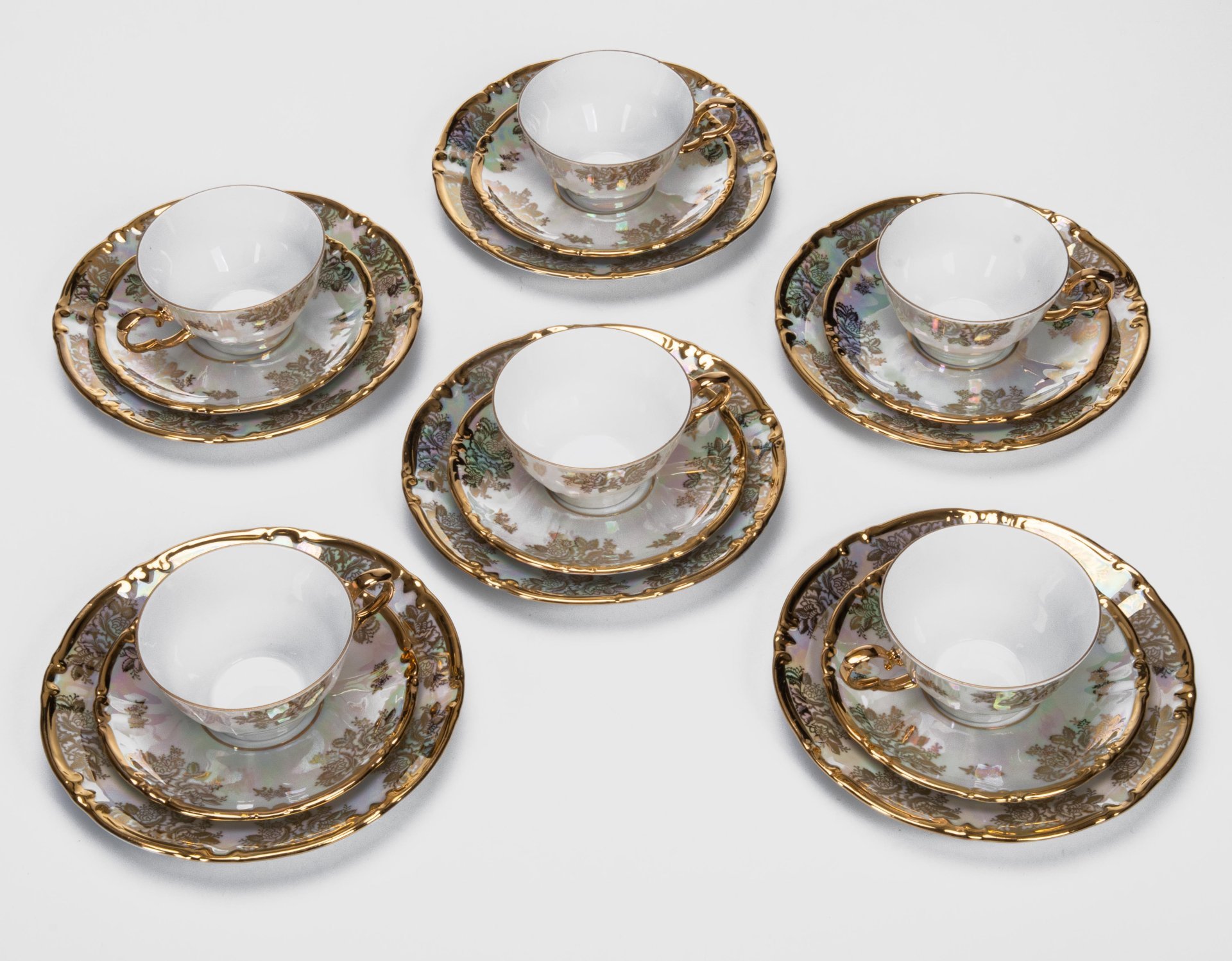 Набор из 6-ти чайных трио, украшенных растительным декором, Roschützer Porzellanfabrik Unger & Schilde