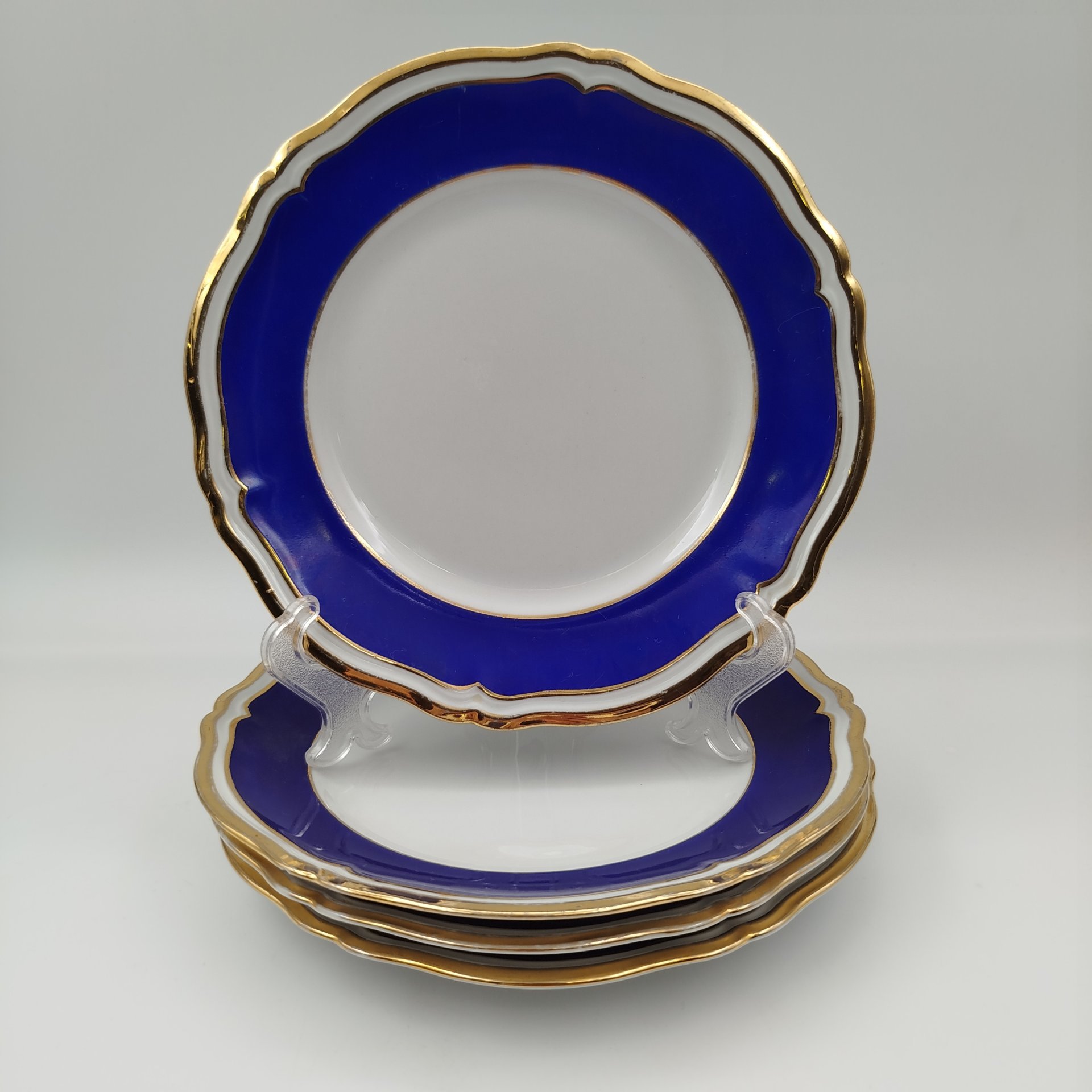 Набор десертных тарелок с синем кантом на 4 персоны, фарфор, крытье, золочение, Западная Европа, 1950-1970 гг.