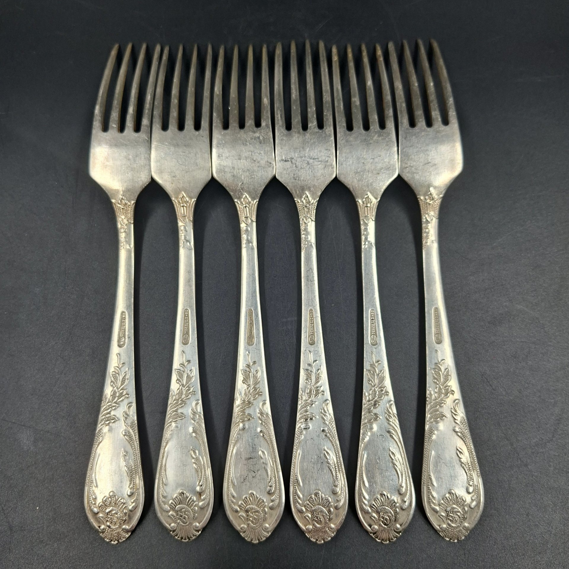 Набор из шести столовых вилок с растительным декором, мНЦ (медь-никель-цинк), Вольнянский завод столовых приборов им. Шевченко (ЗiШ, ЗиШ), СССР, 1960-1990 гг.