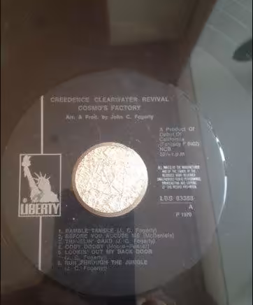 Пластинка в раме, «Creedence»