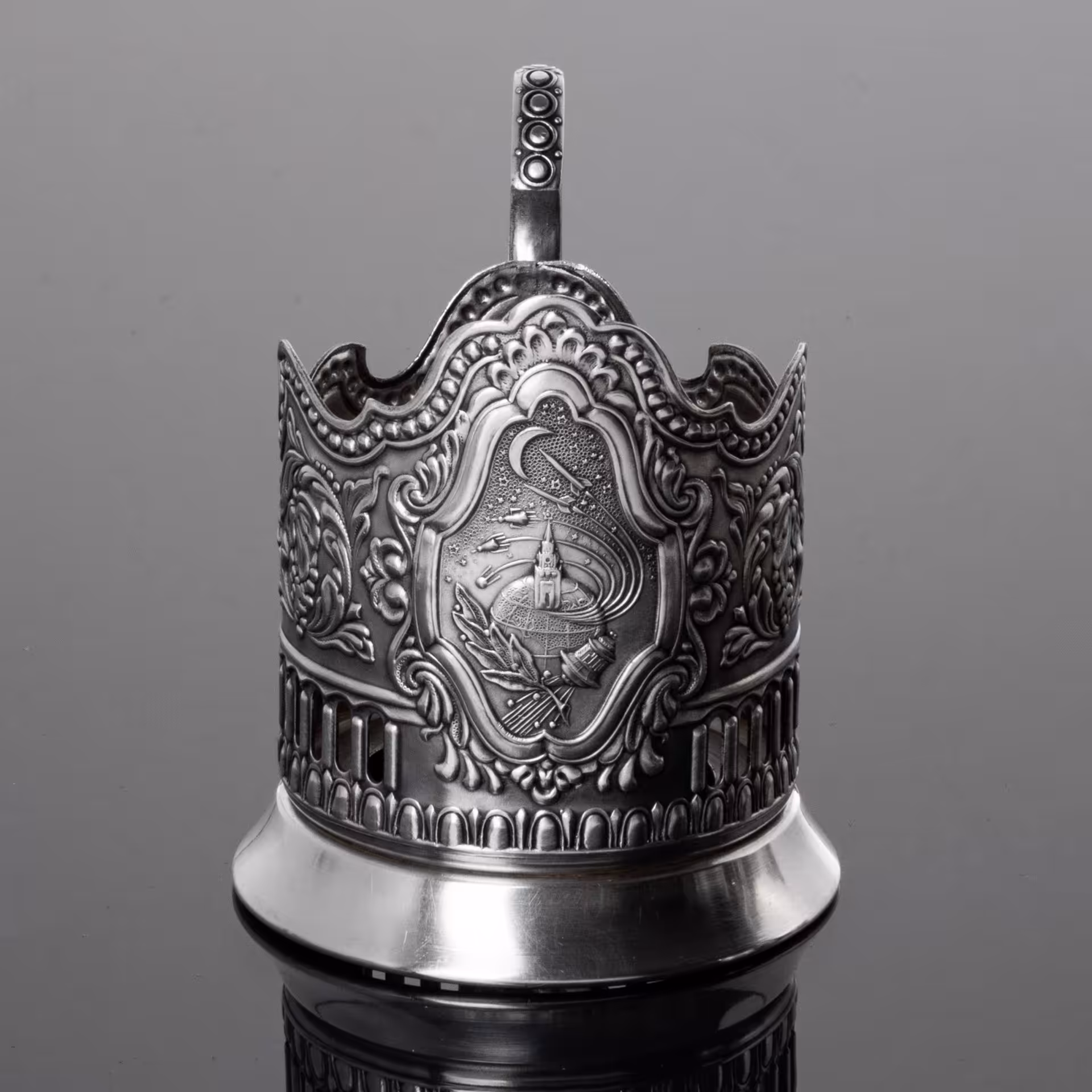 Подстаканник "Советский космос" с рельефным декором и прорезным орнаментом, Кольчугинский завод цветных металлов