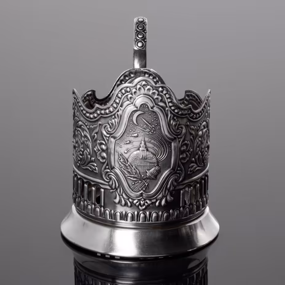 Подстаканник "Советский космос" с рельефным декором и прорезным орнаментом, Кольчугинский завод цветных металлов